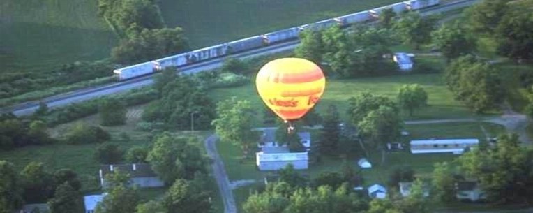 balloon-over-village-w-train-enlarged-as-whole.jpg