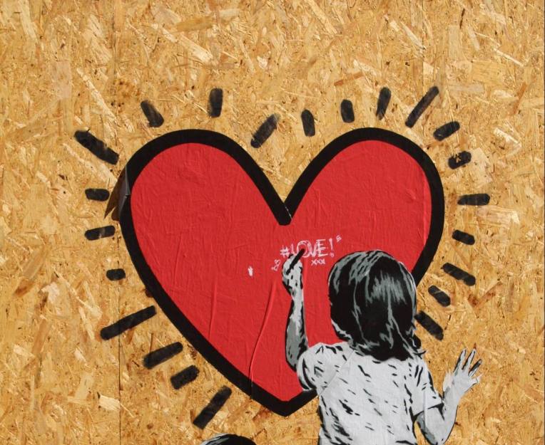 GIRL DRAWING HEART ON WALL - cropped -- SFerrario - PX